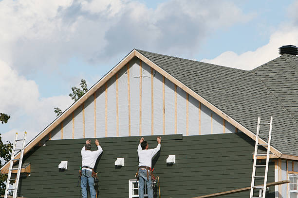 Professional Siding technician working in Madison, OH